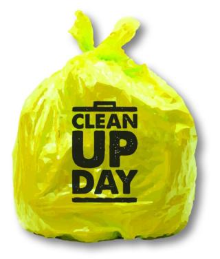 Yellow trash sack that says "Clean Up Day"